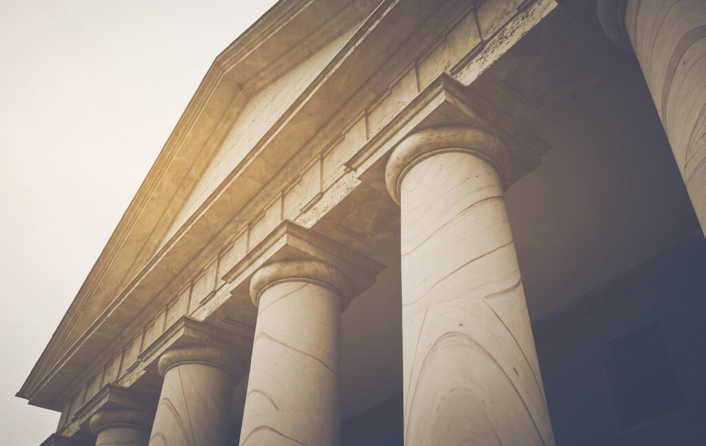 Stone columns and pediment of a courthouse facade